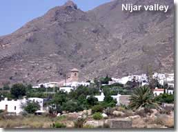 Descending Sierra Alhamilla through Nijar valley and the whitewashed village of Nijar